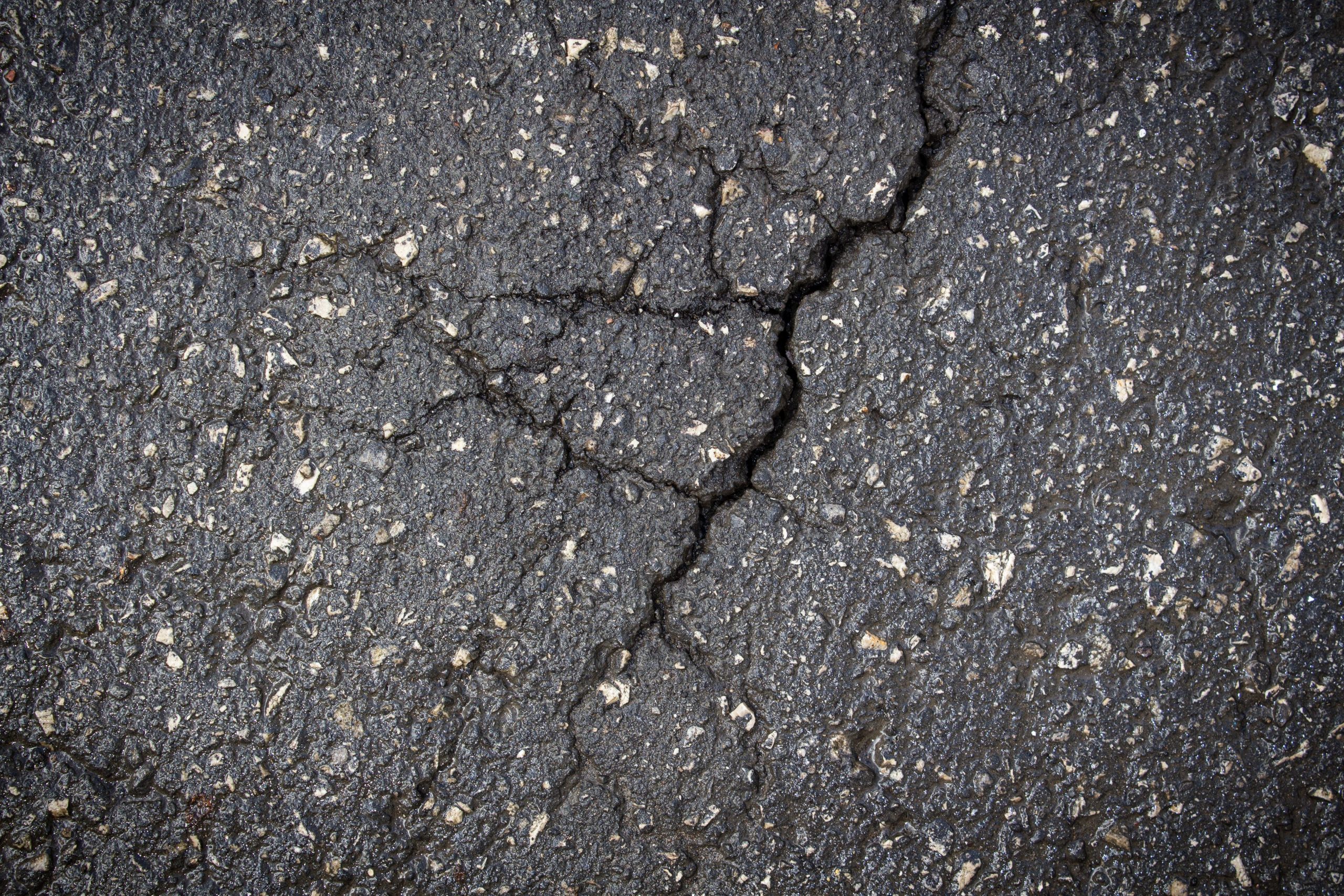 Small cracks are a sign you need sealcoating. 